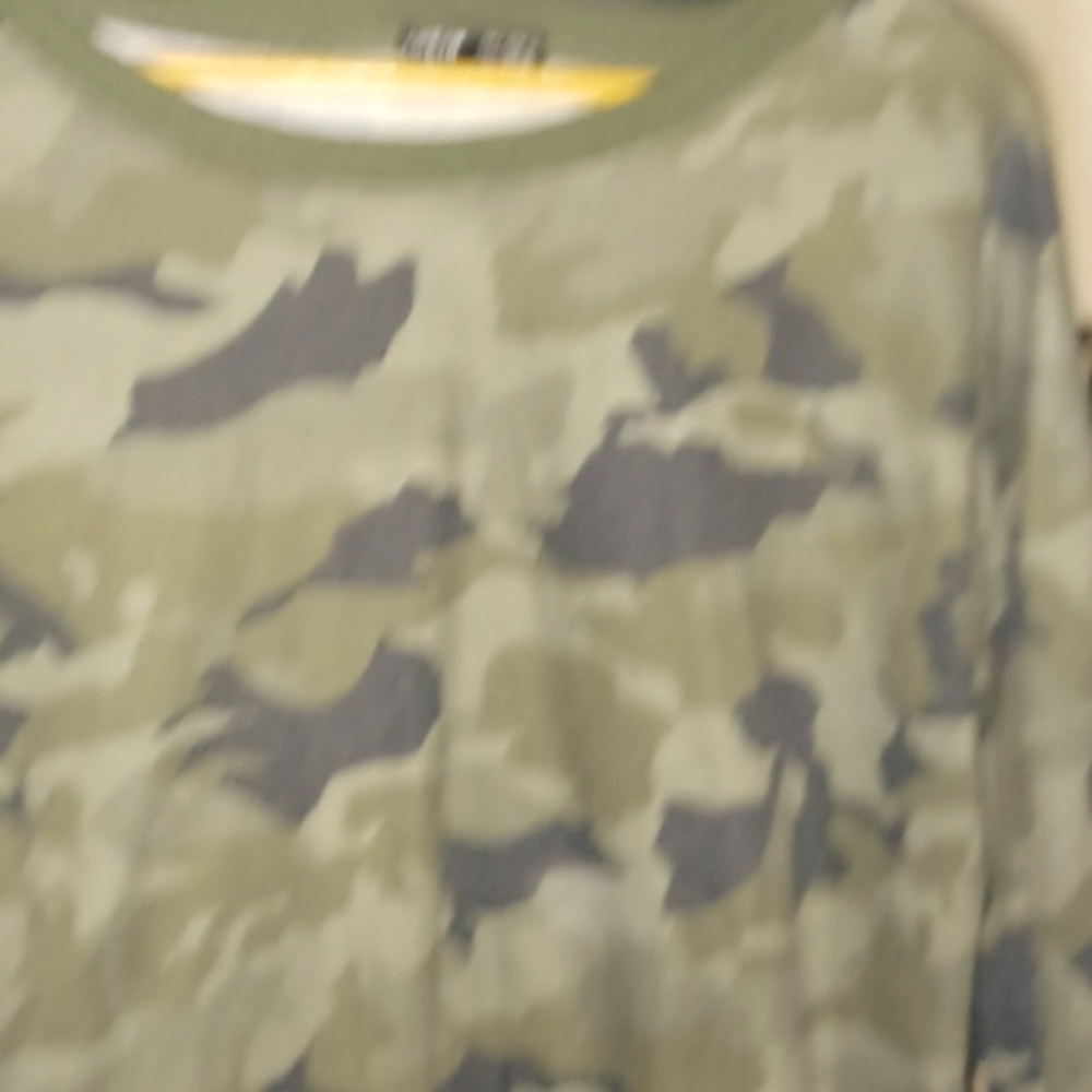A camouflage long sleeve shirt it's very comfortable and stretch material